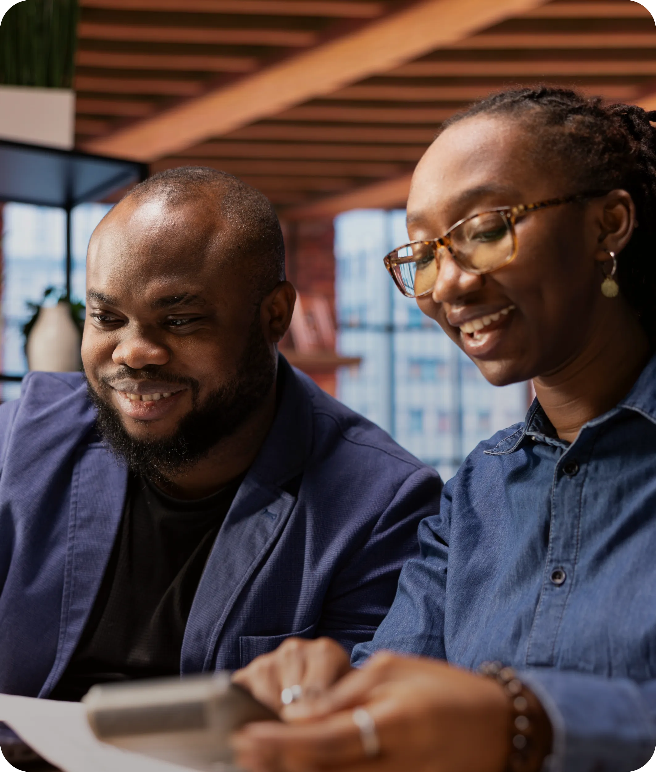 Two people reviewing event content